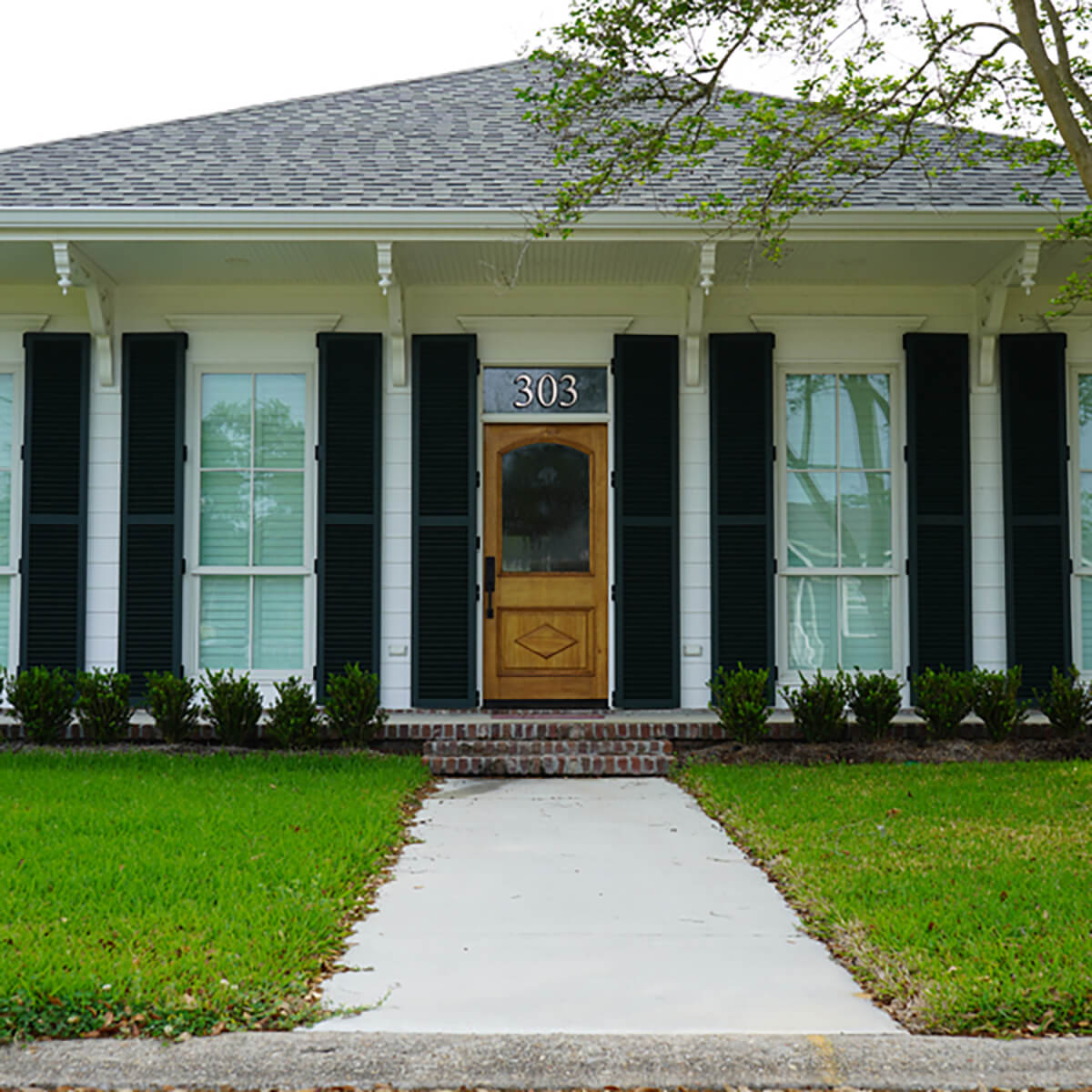 House with Signature Shutters installed